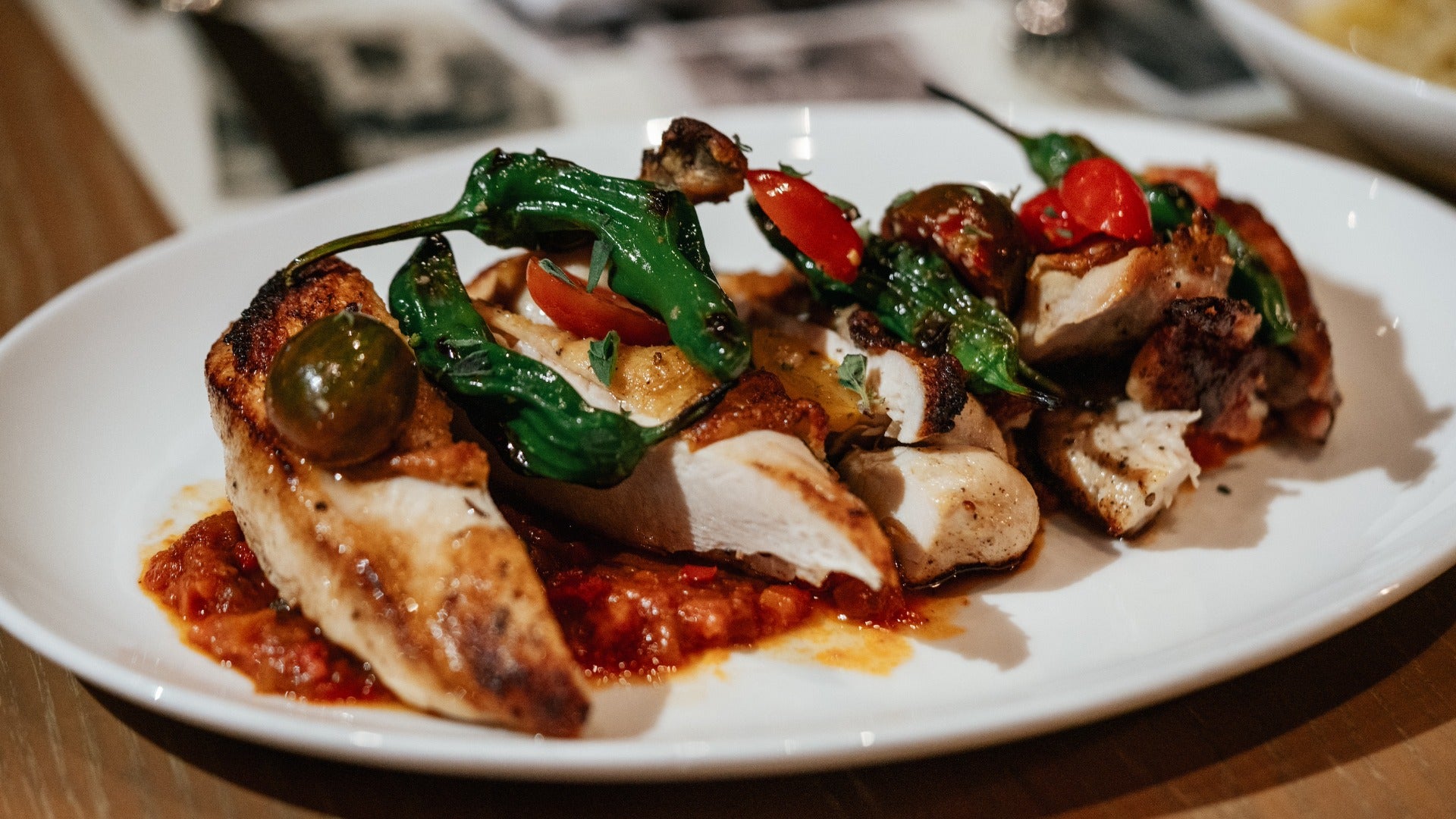 chicken dish with vegetables on a plate