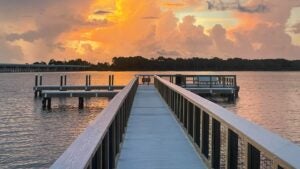 pier dock over a lake with island in view