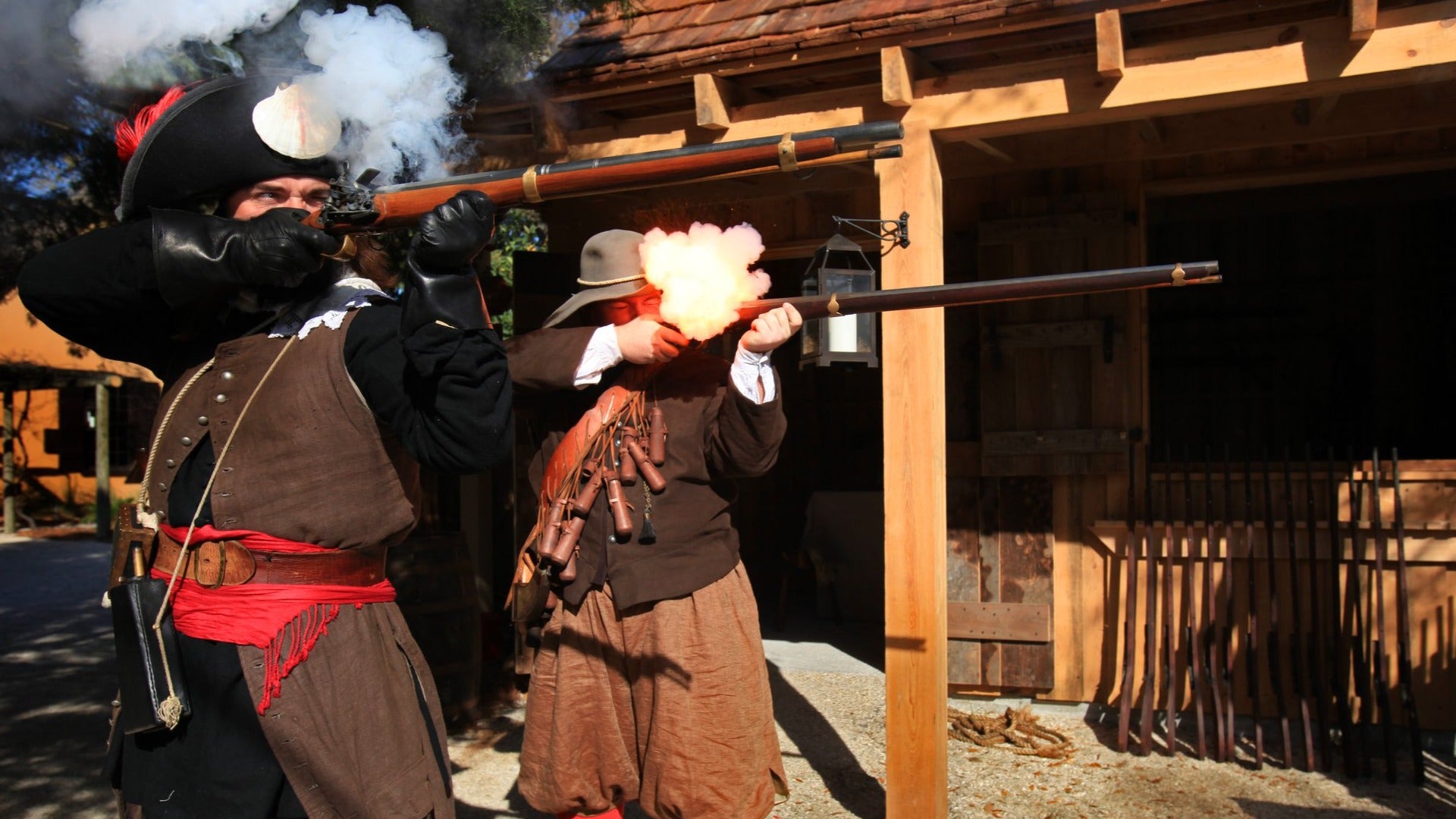 men in colonial costumes reenacting a scene