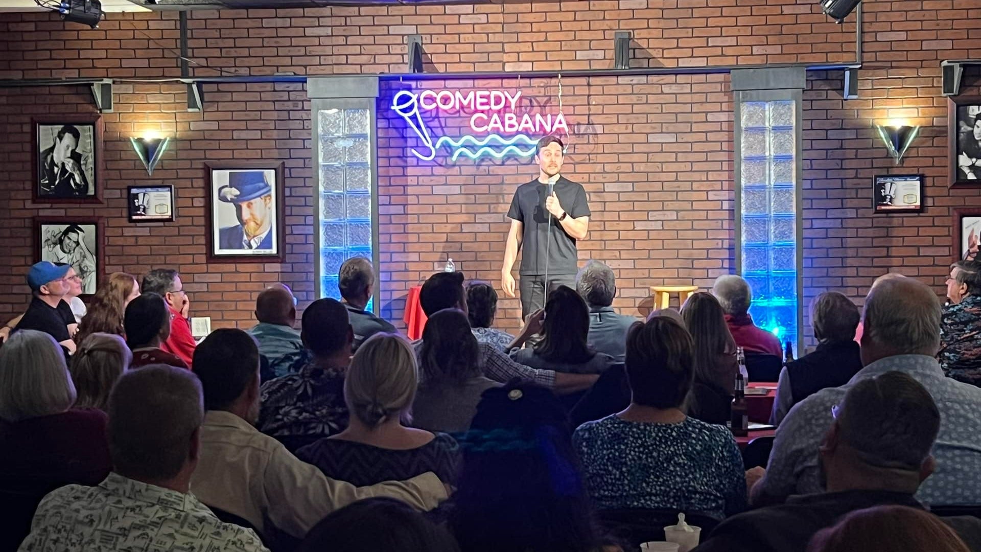 standup comedy performer in front of an audience