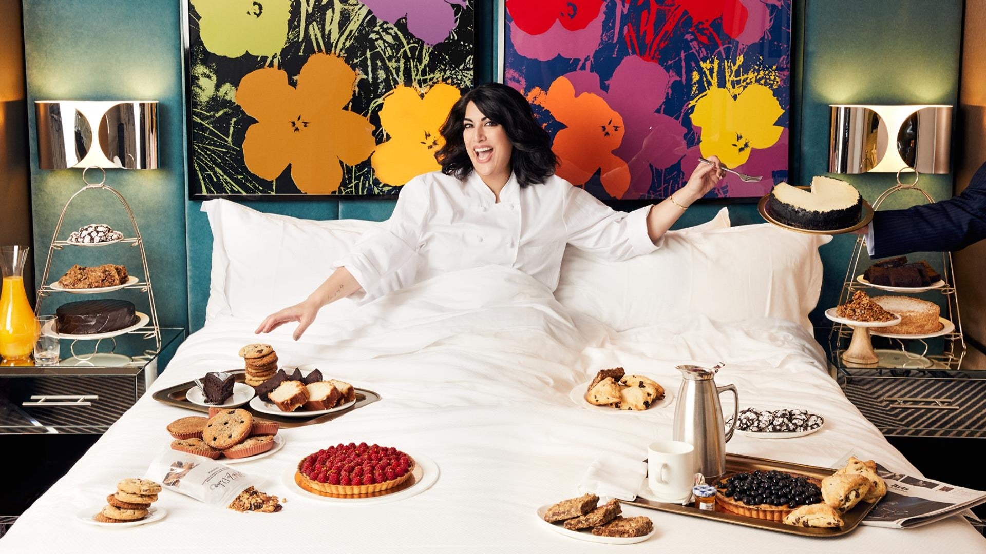 woman enjoying hotel room service