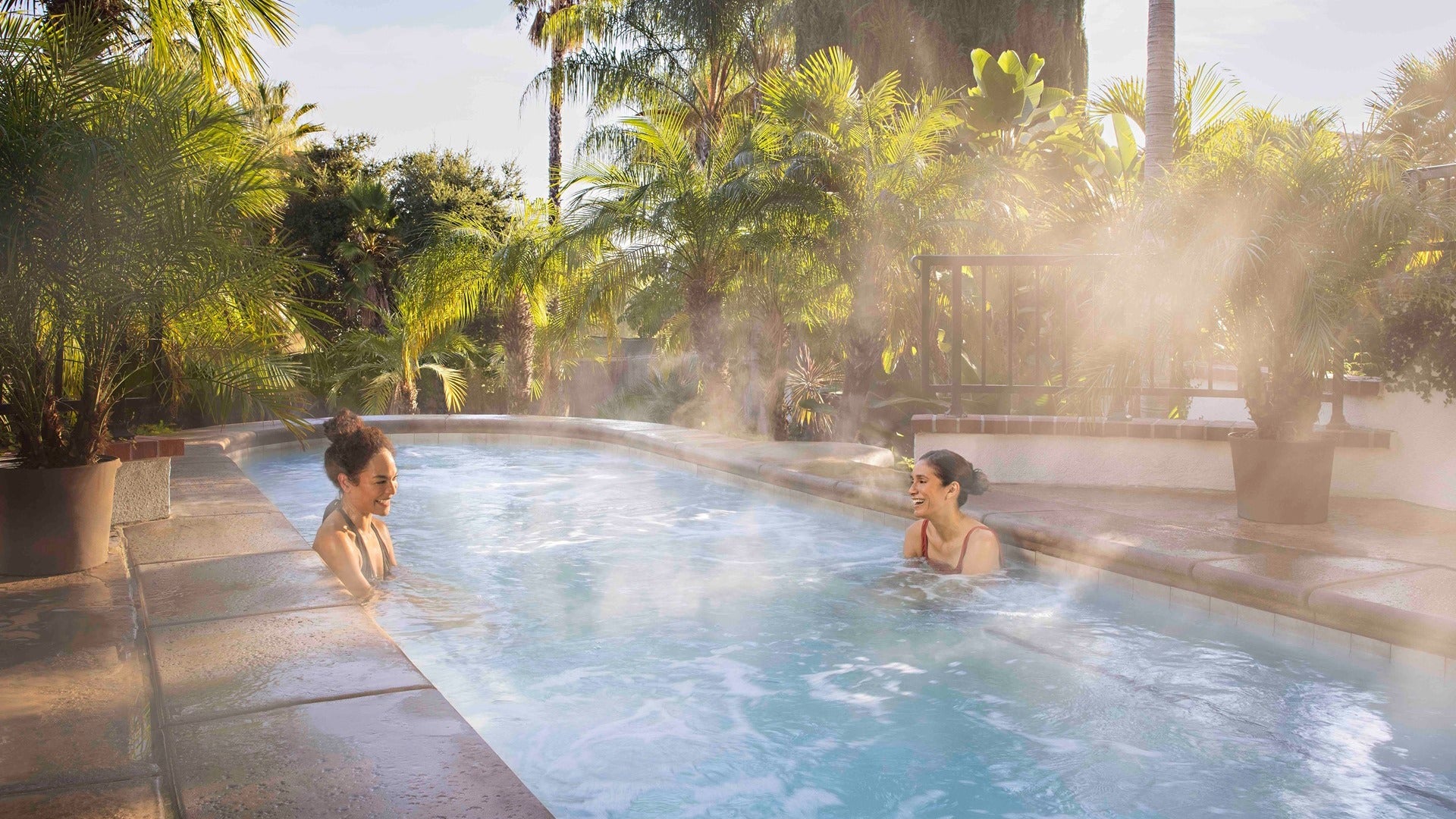 two women enjoying a hot spring