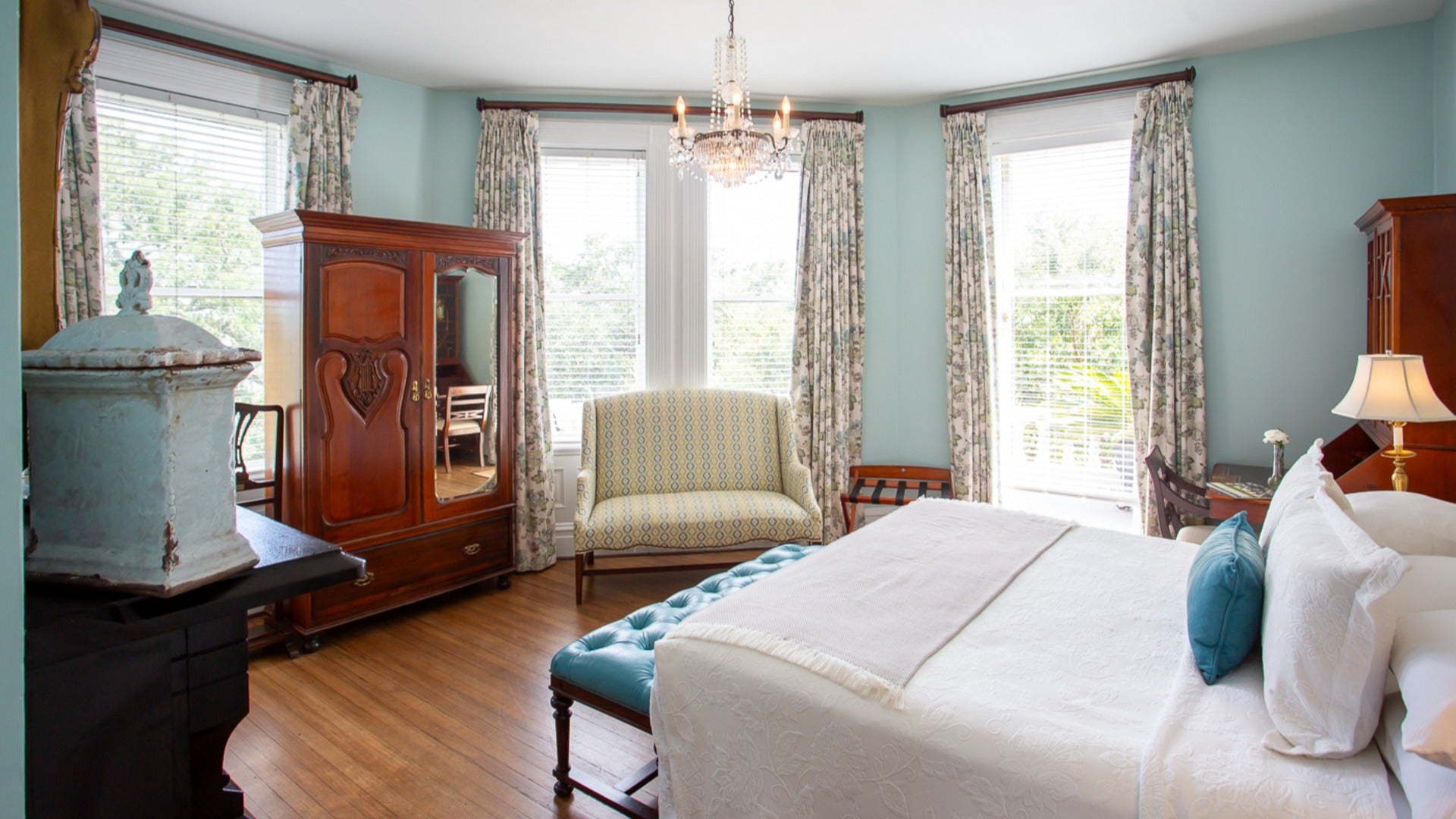 hotel room bed, chair, closet, curtains and window