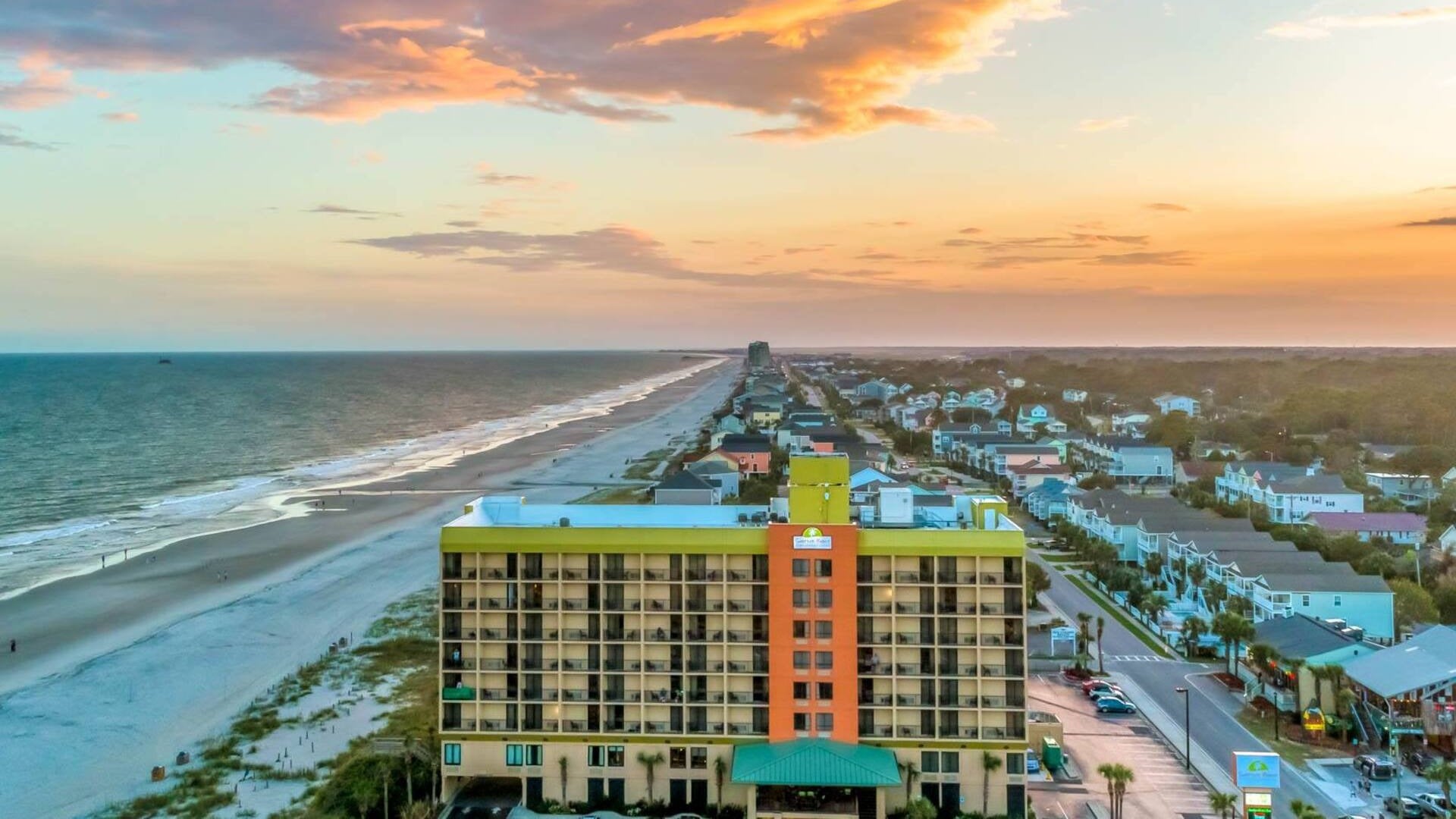 street lined with hotels and beachside shore