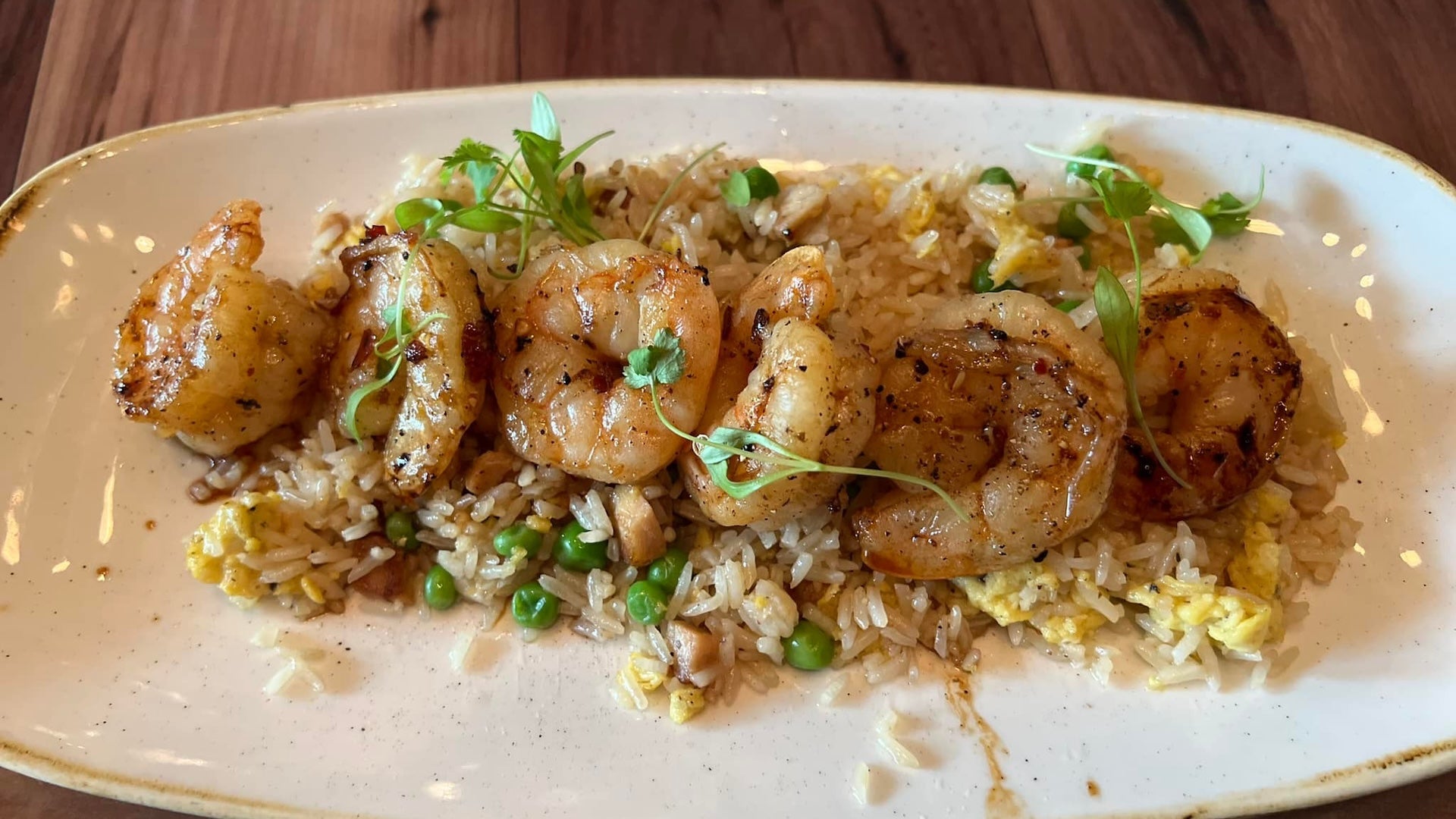 a plate with shrimp and rice