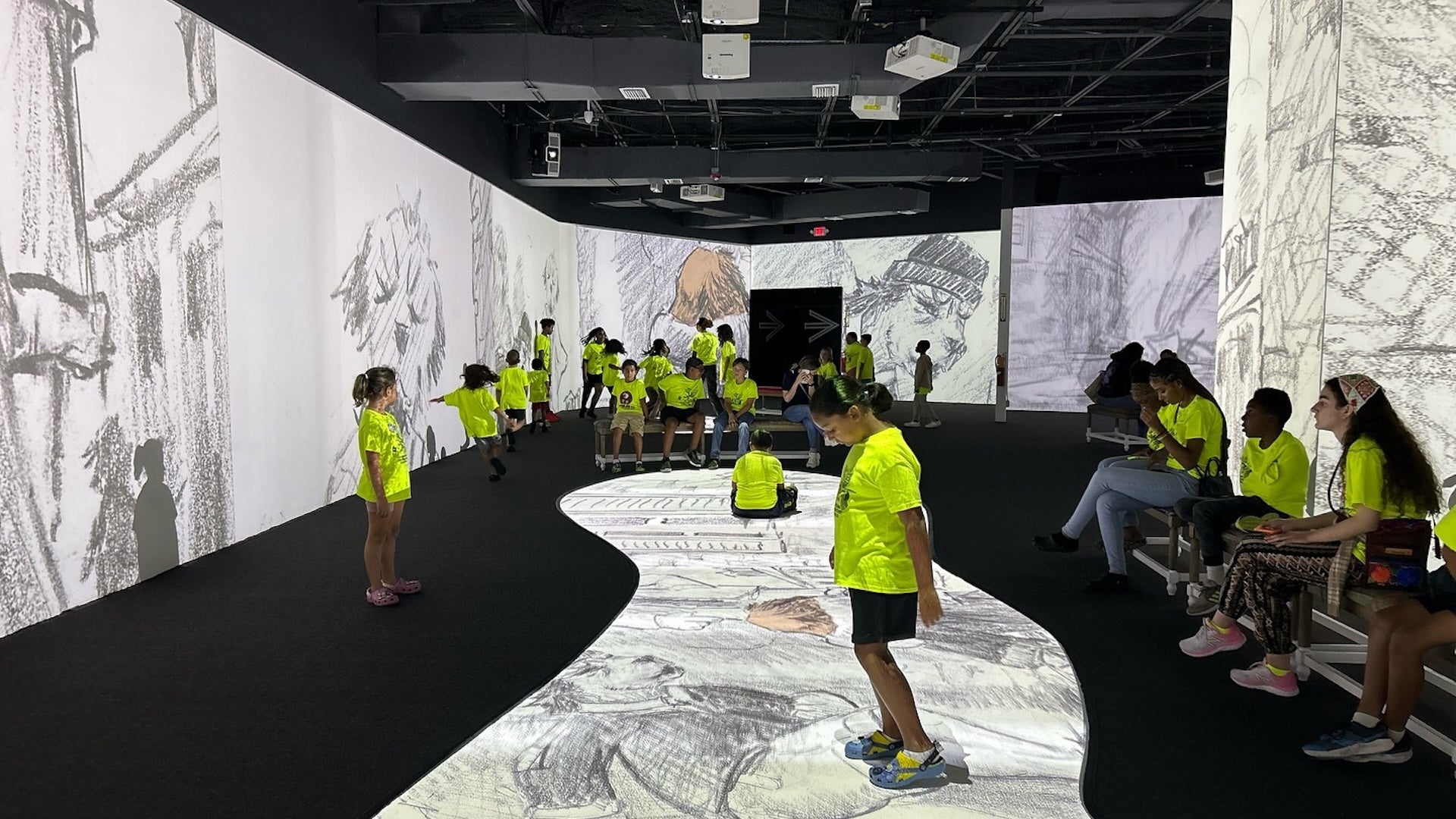 kids playing inside Lonely Dog exhibit