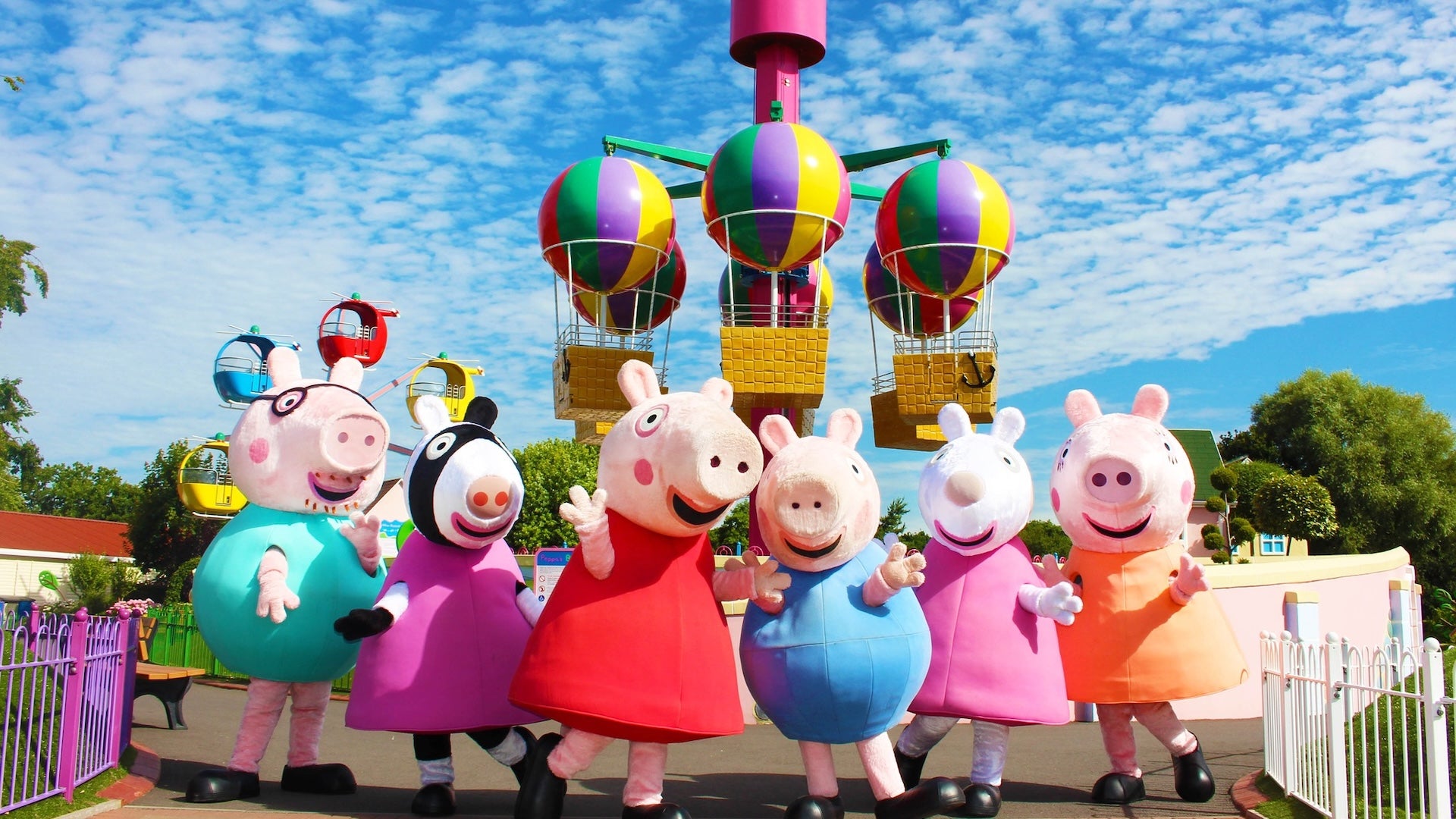 Peppa pig and friends in a theme park