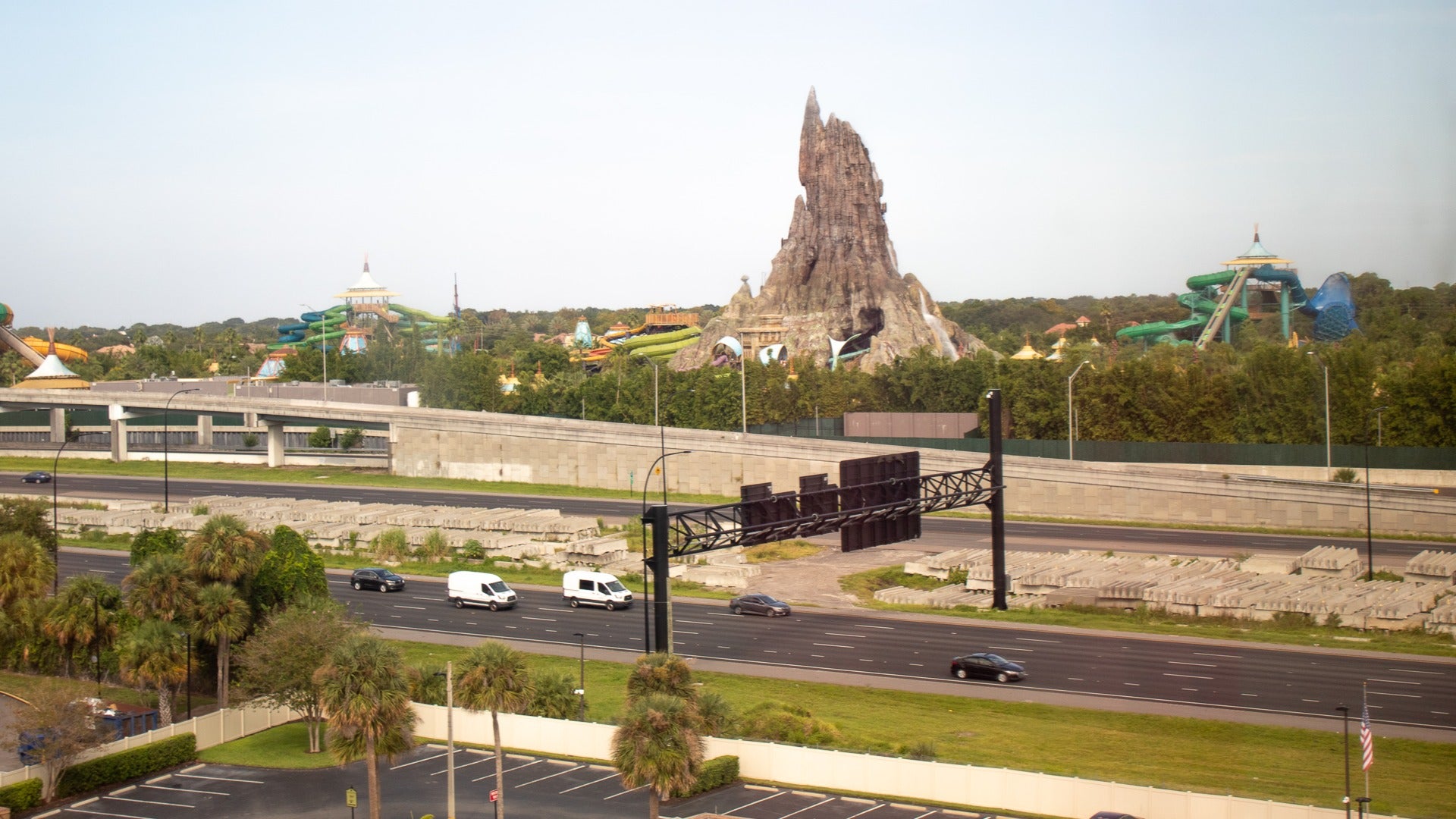 volcano bay view from hotel, with street in front and cars