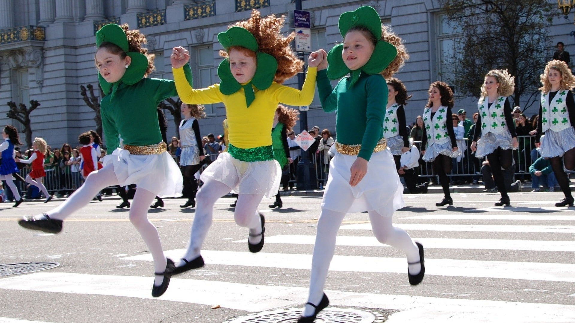 children in costumes at a parade on st patricks day