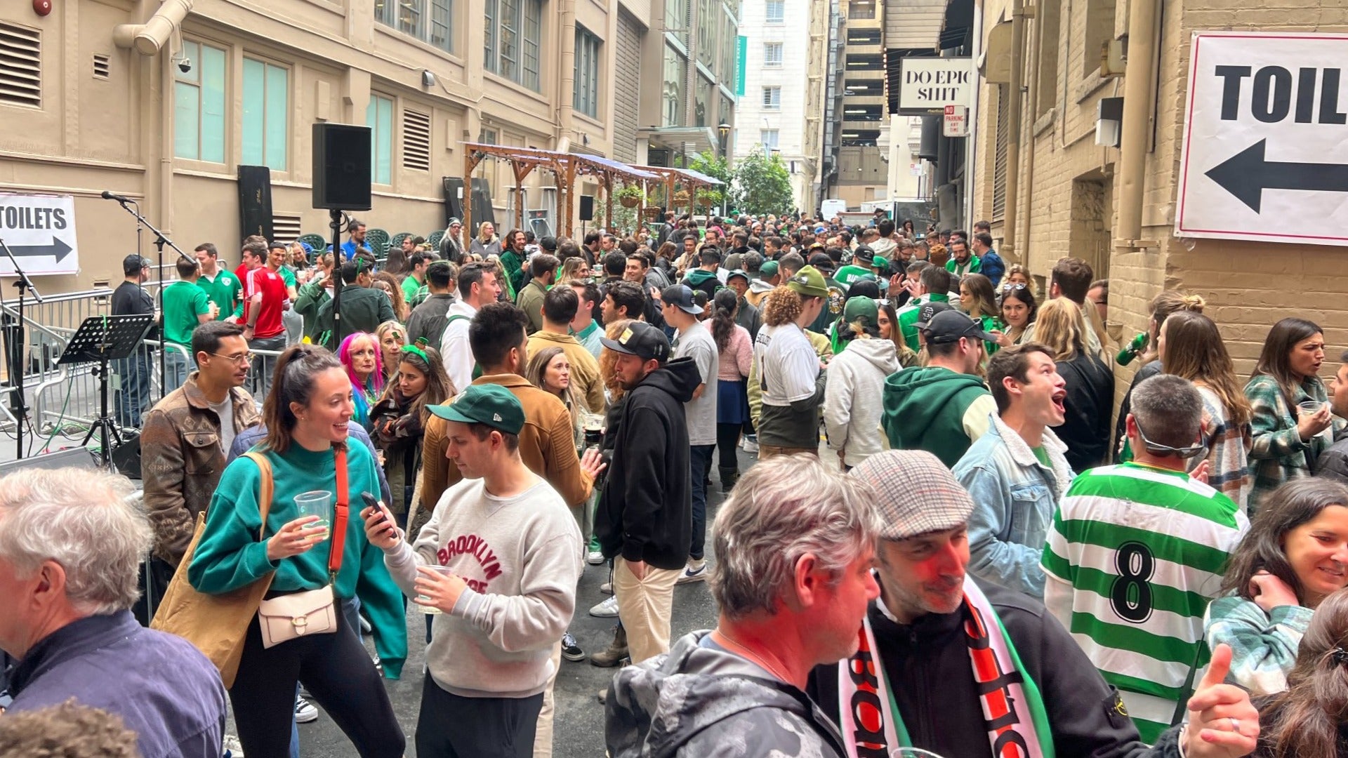 group of people at a block party on st patricks day