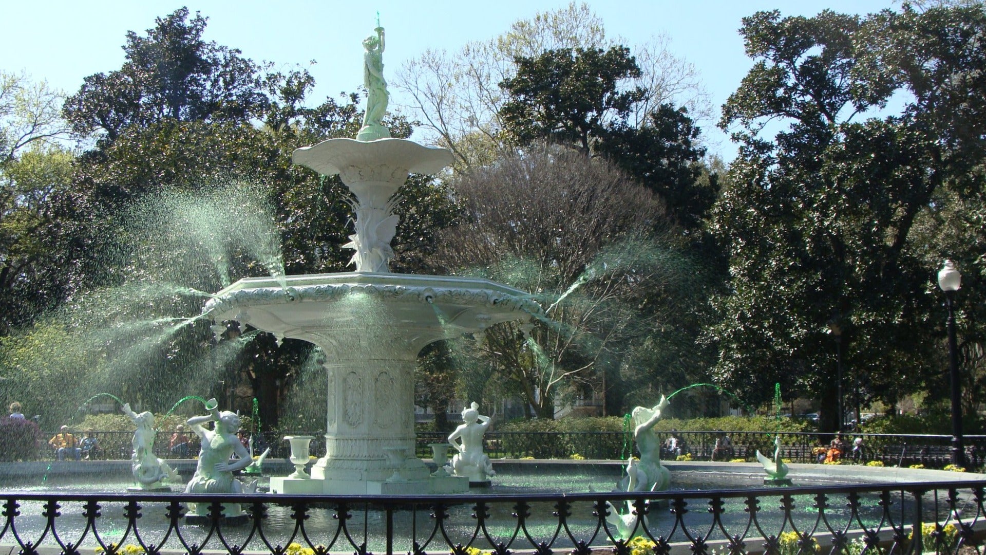 greening of the fountain at forsyth park in savannah, trees at the back