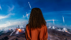 back of a girl watching launching spaceships