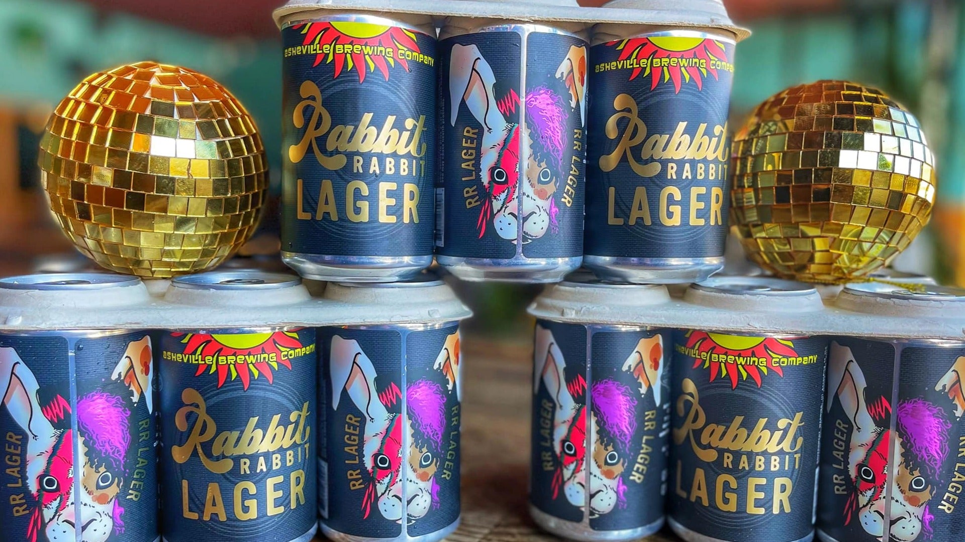 cans of lager brews stacked on top of one another