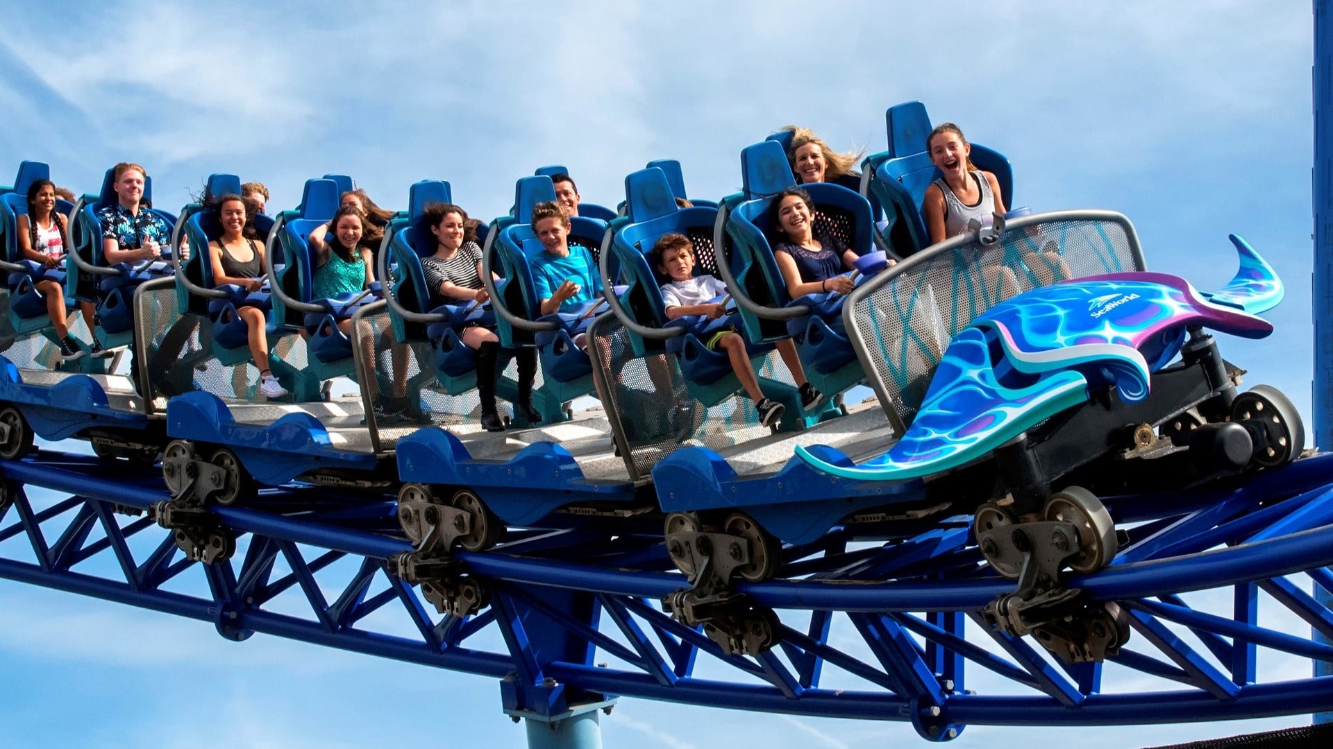 people riding a roller coaster