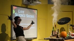 a woman wearing goggles in the lab