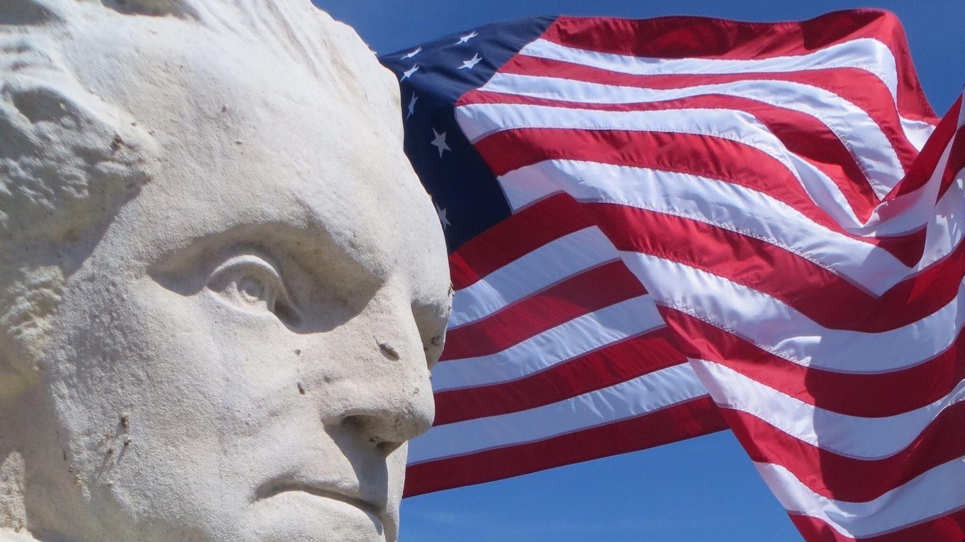 a statue with American flag