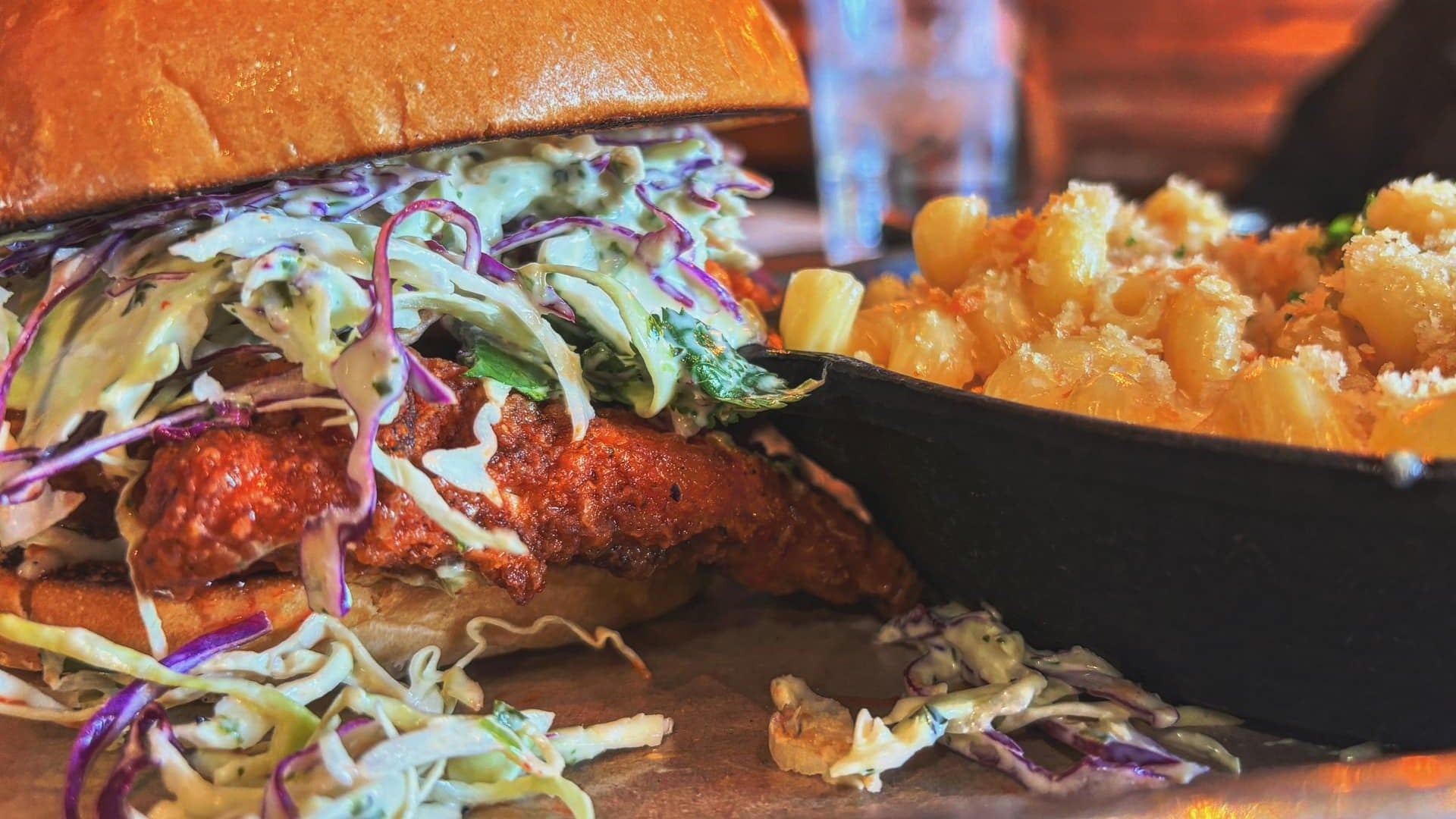 burger with coleslaw and mac and cheese