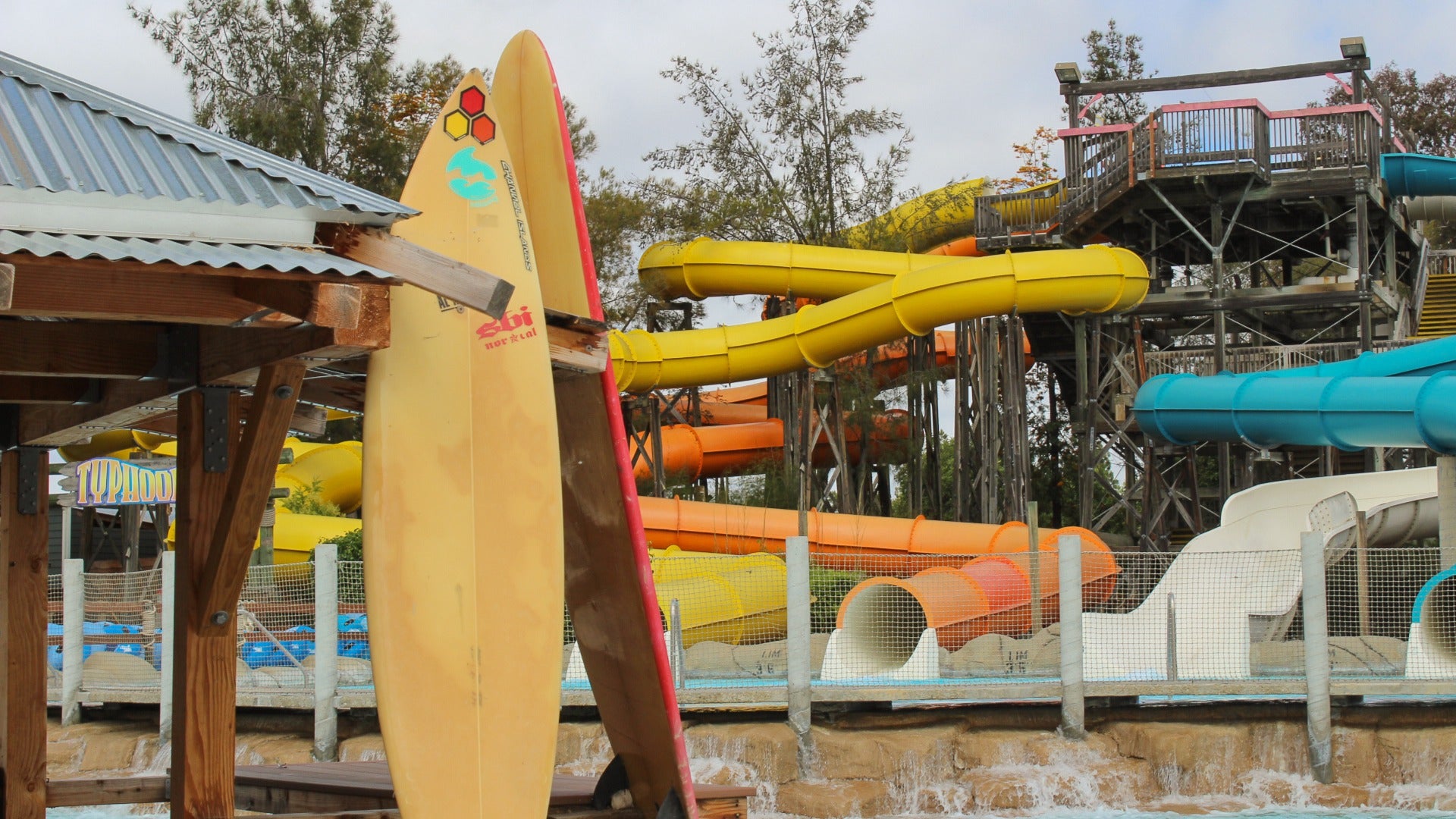 waterpark with slides and surfboard and water features