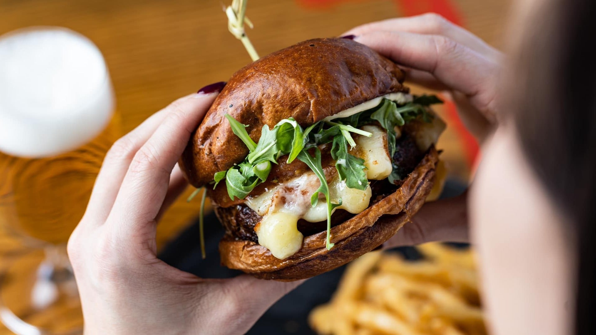 burger with veggies and cheese and patty