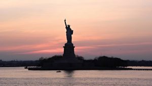 statue of liberty during sunset