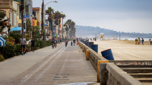 a street view with people walking