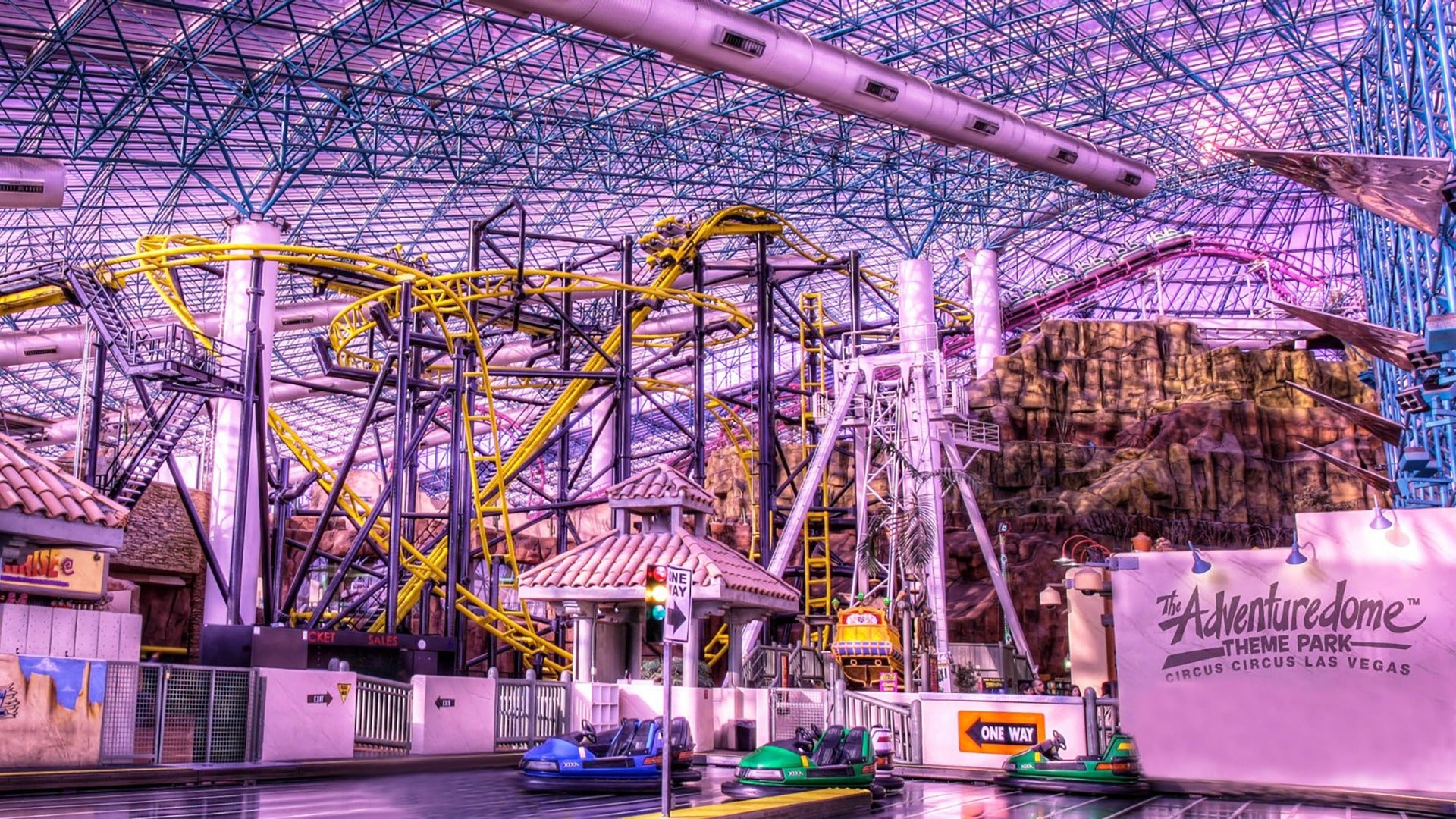 amusement park with roller coaster and bumper cars