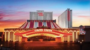 hotel exterior with circus tent and lights