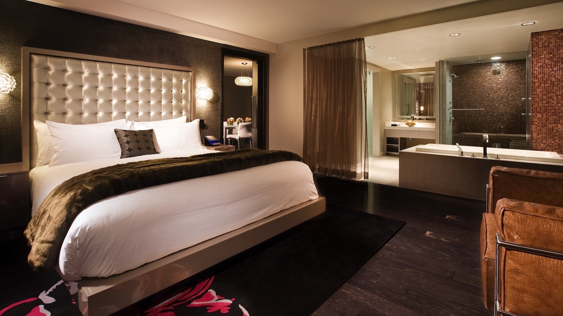 a California king bed with a bathtub