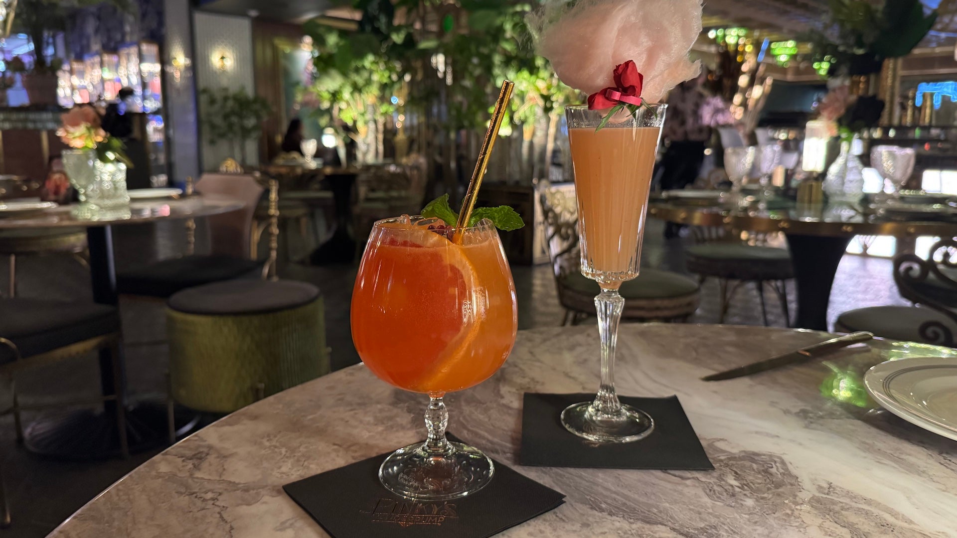 Two cocktails on a table
