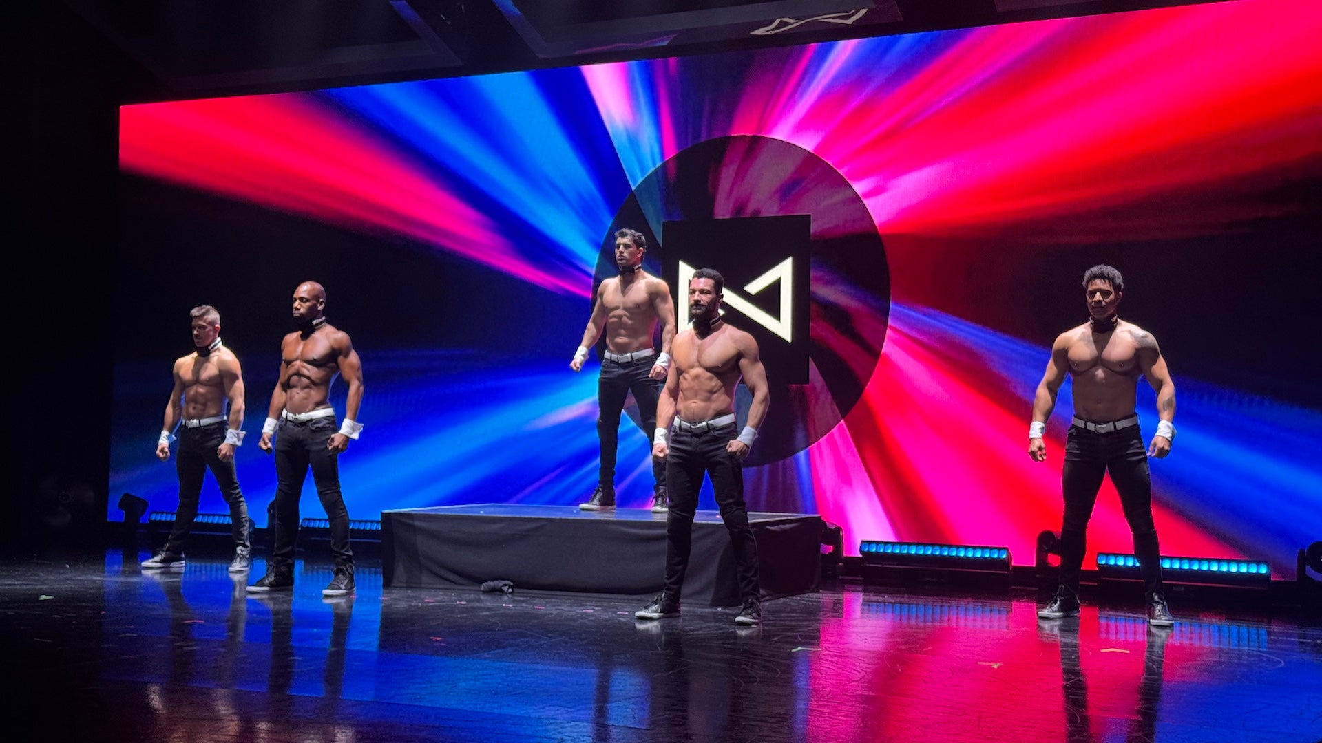 male dancers performing on stage