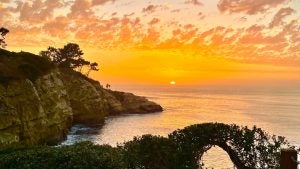 sunset view of the beach from the mountain