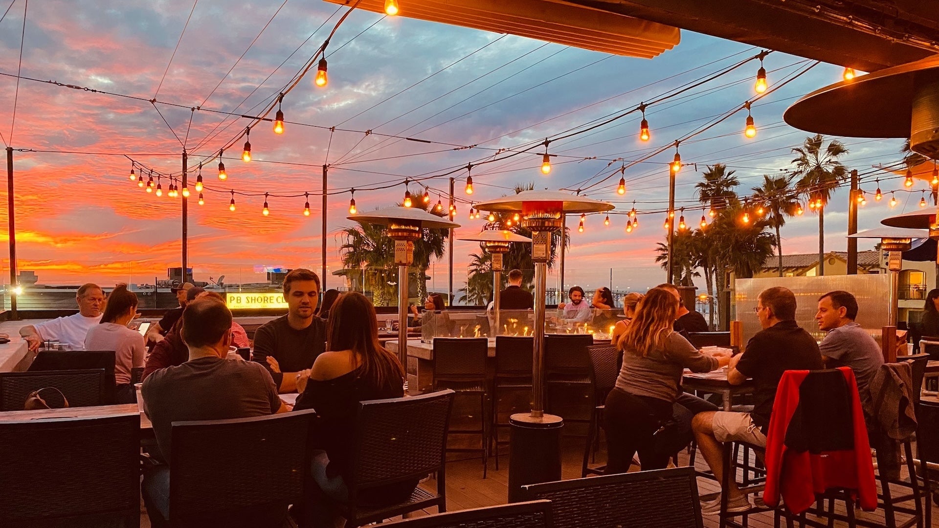 people dining during sunset