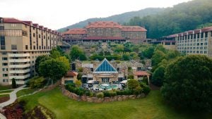 resort on a mountainside with pool