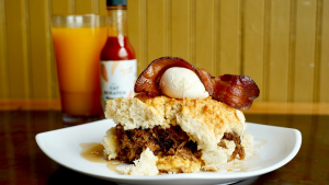 bacon and pancakes with juice at the back