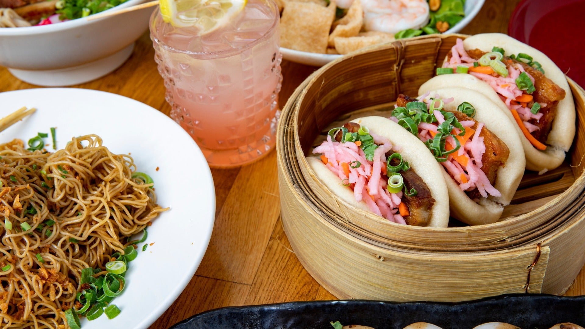 noodles and buns with a drink