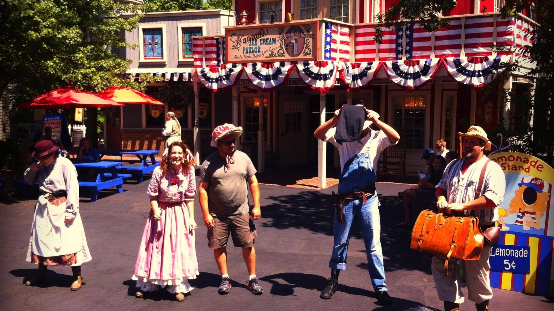 street performers in costume at a theme park