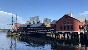 Boston tea party ships and museum with downtown Boston in the background