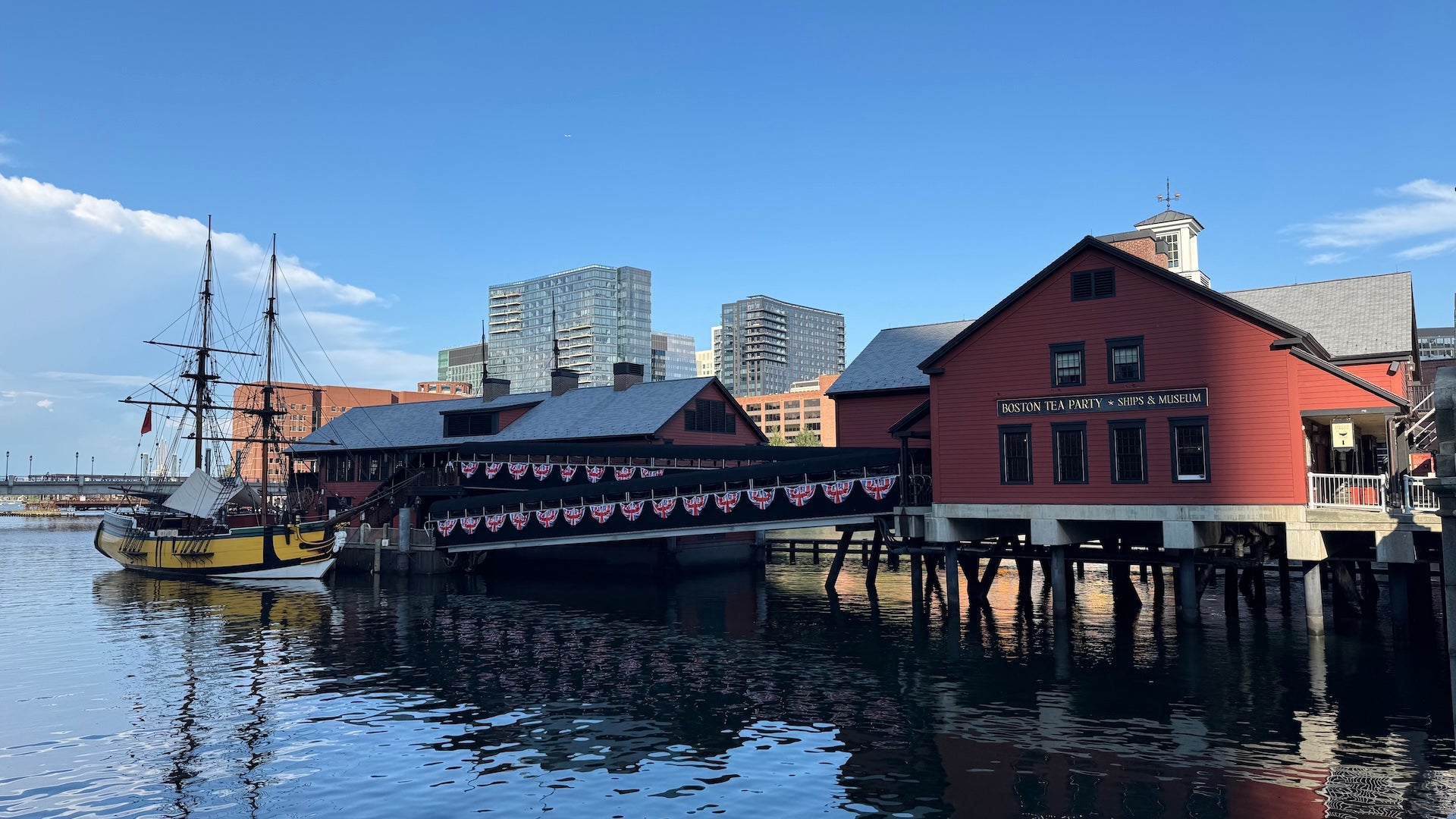 Boston tea party ships and museum with downtown Boston in the background