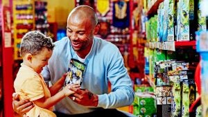 father and son buying legos together