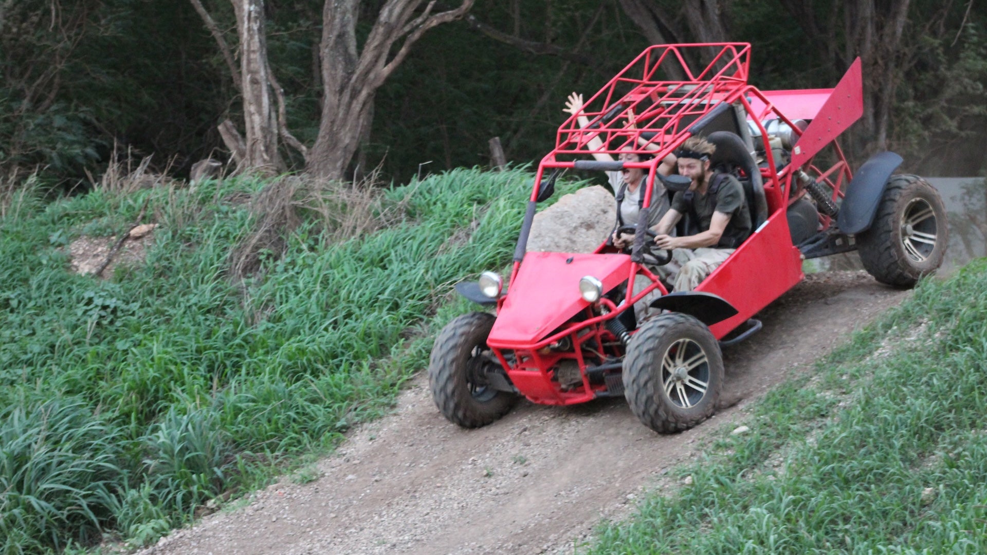 an ATV ride going down a hill