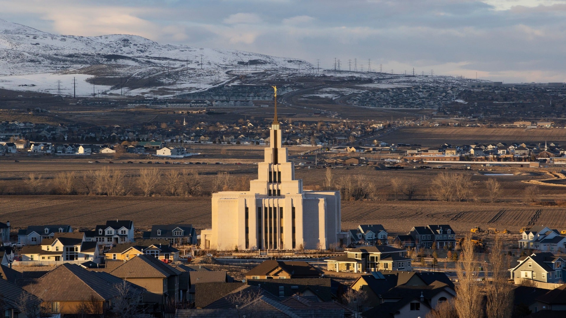 church with a view of mountains in the back