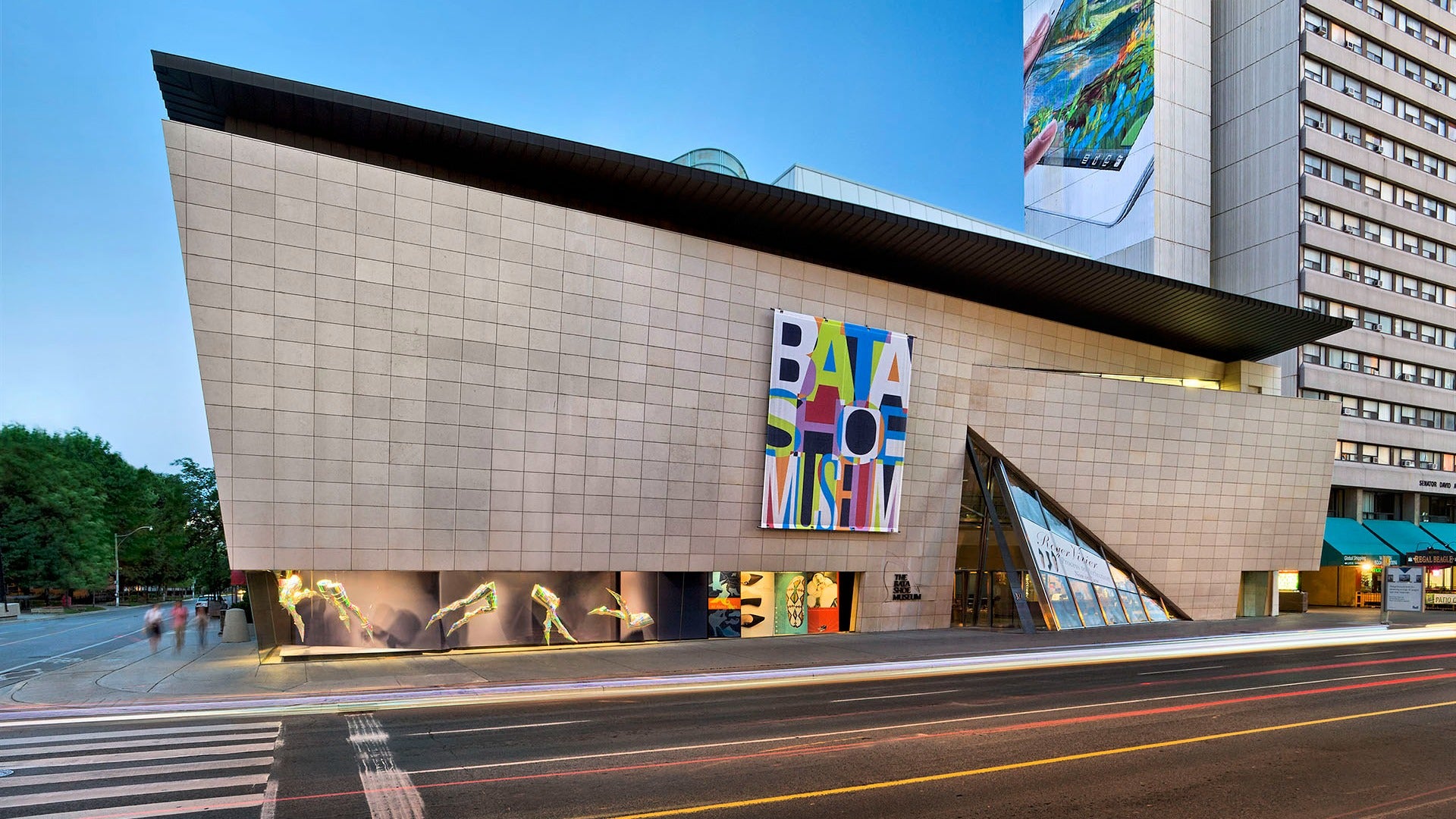 museum exterior with signage in front of the street