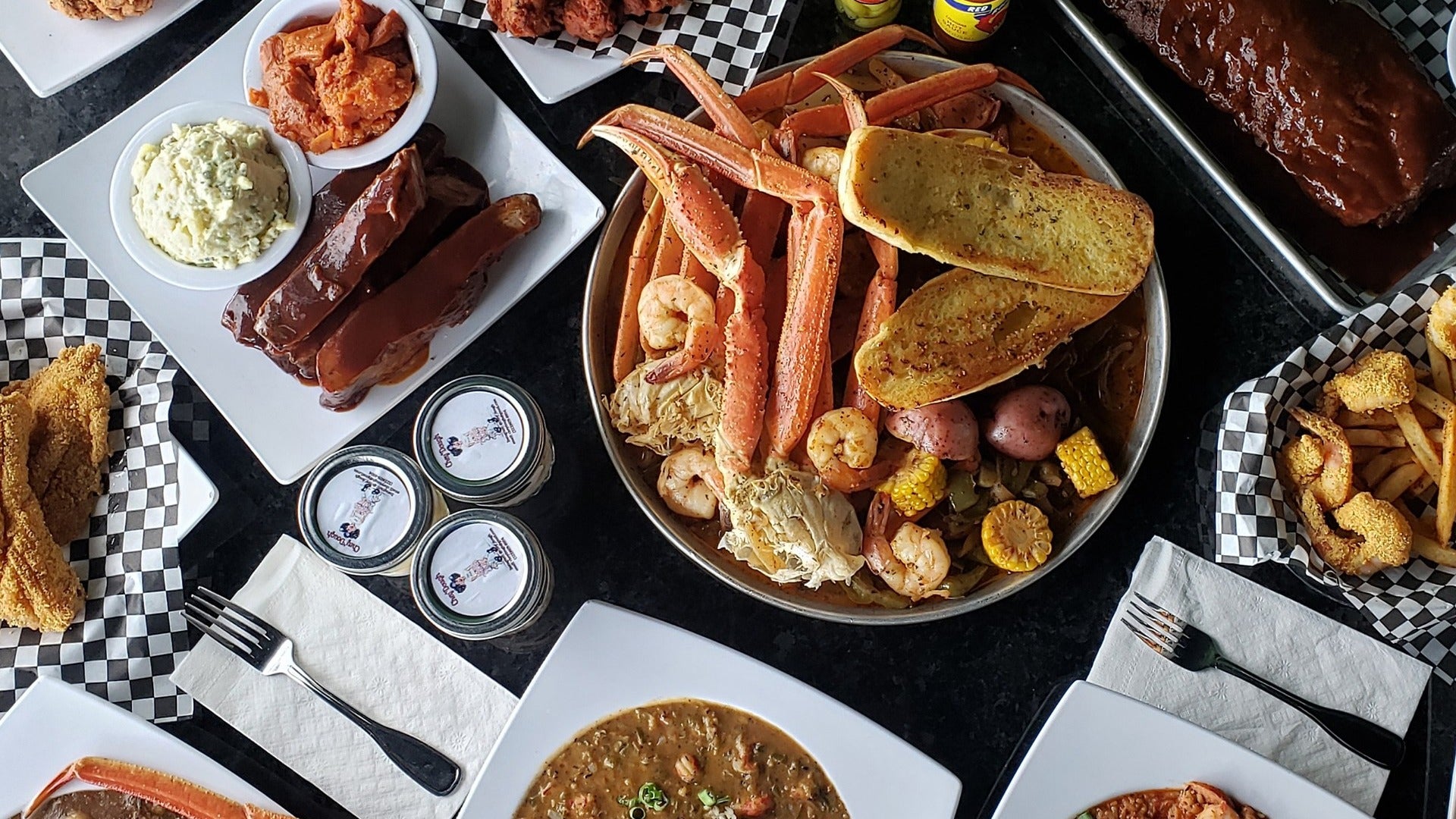 cajun, seafood, bread, wings, and fries spread