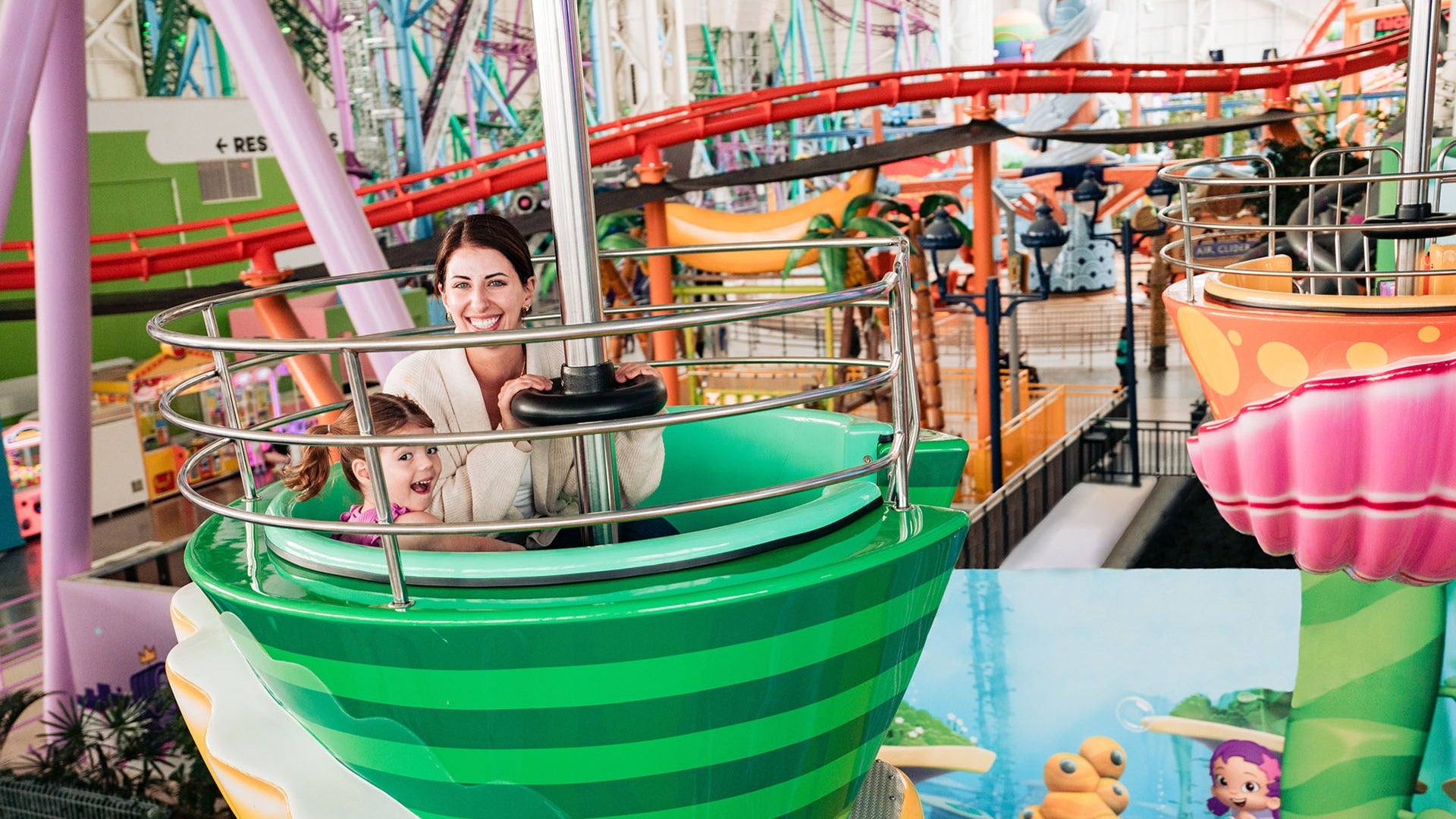 mother and child on an amusement park ride
