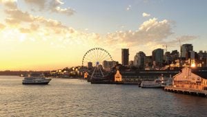 cruise boat passing by seattle skyline