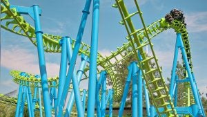 people in a roller coaster