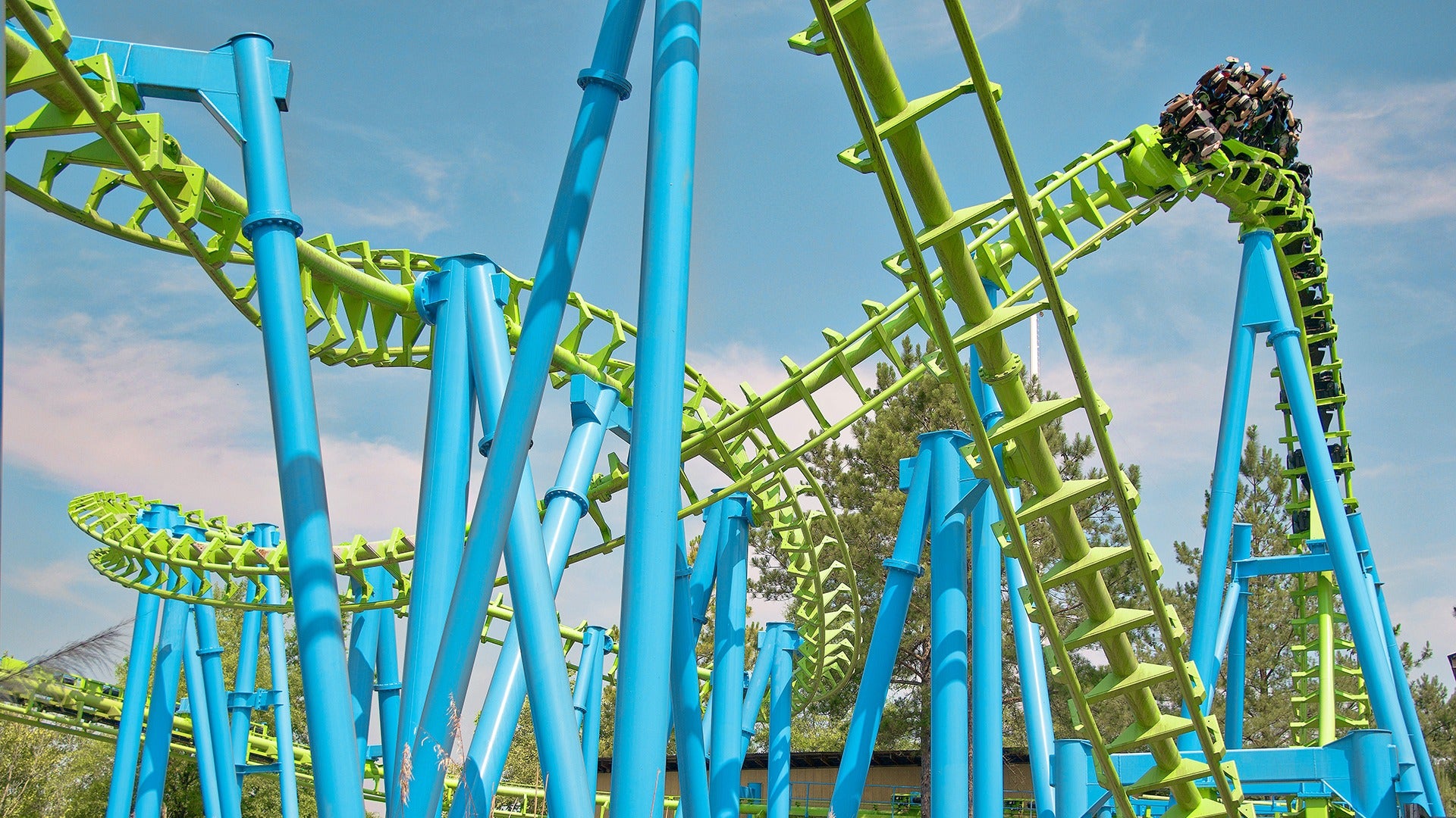 people in a roller coaster