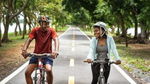 a couple having fun while biking