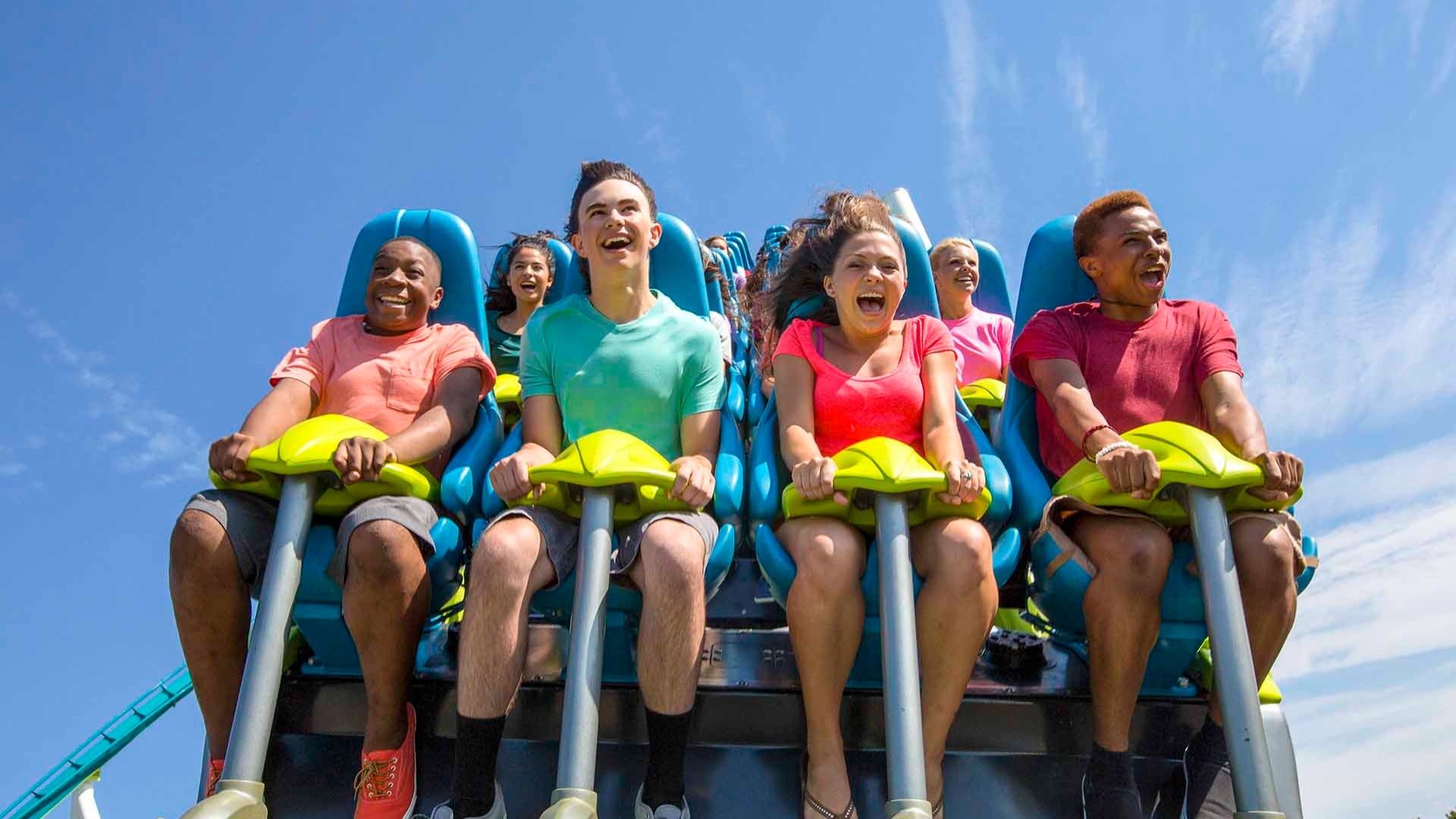 people on a roller coaster