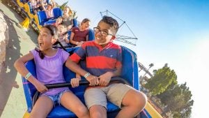 a group of people in a roller coaster